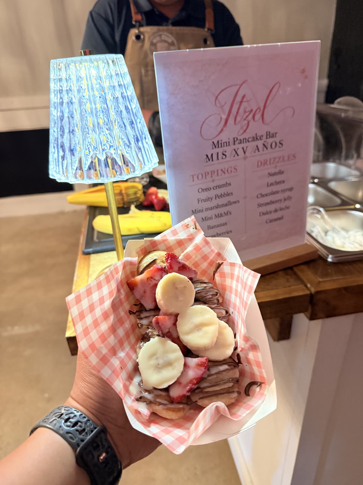 A tray of mini pancakes at a XV pancake bar
